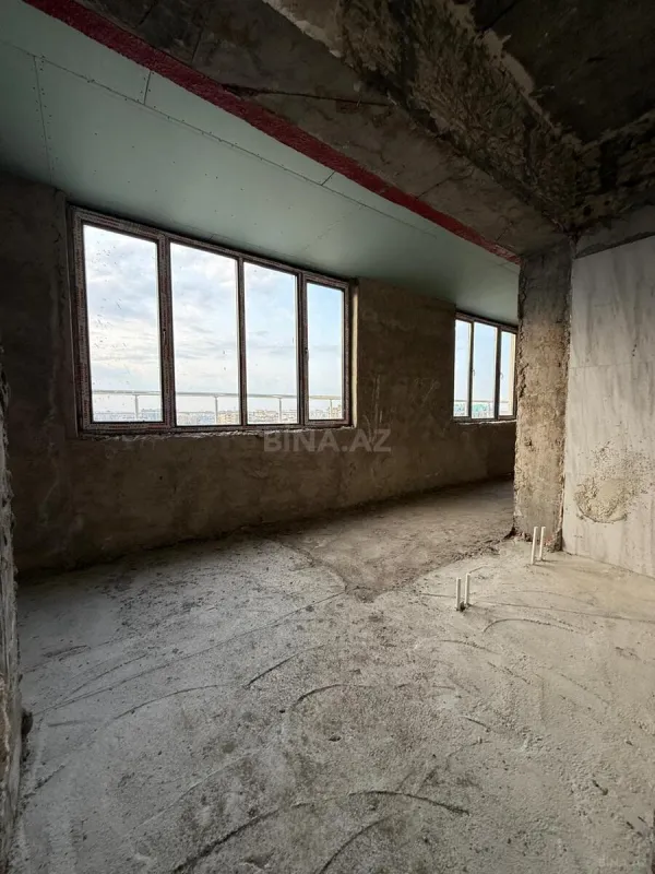 Satılır 4 otaqlı mənzil 209 m²