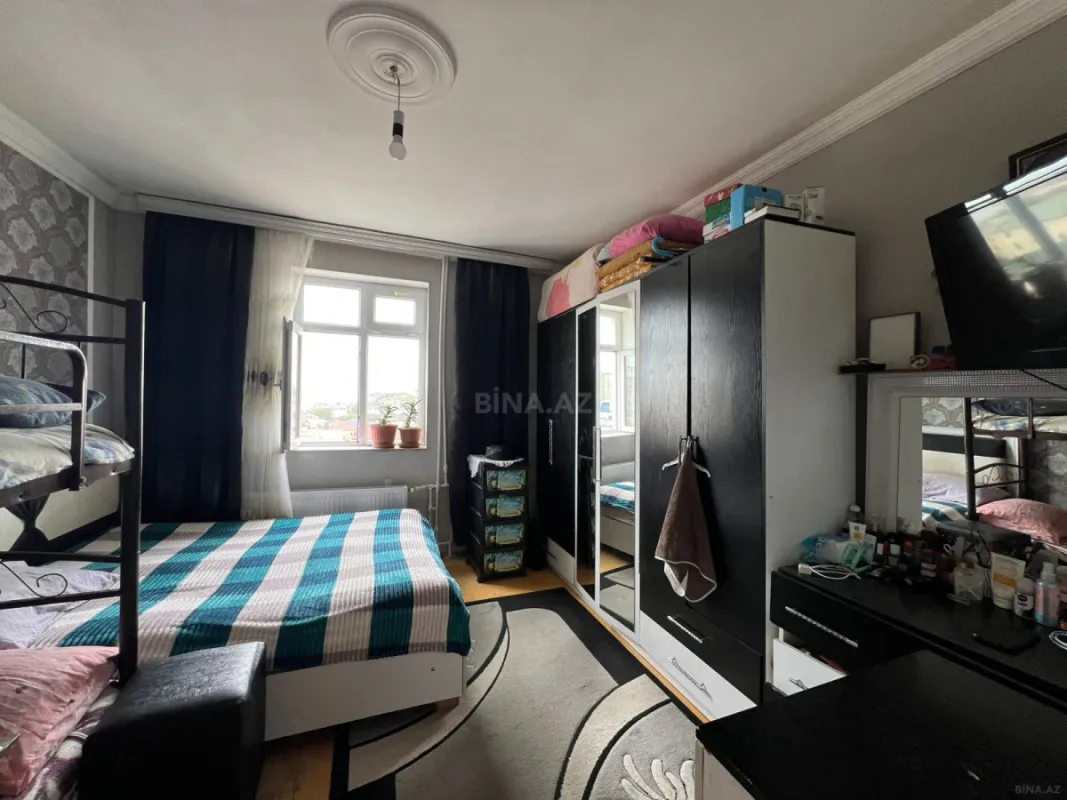 Satılır 2 otaqlı mənzil 56 m²