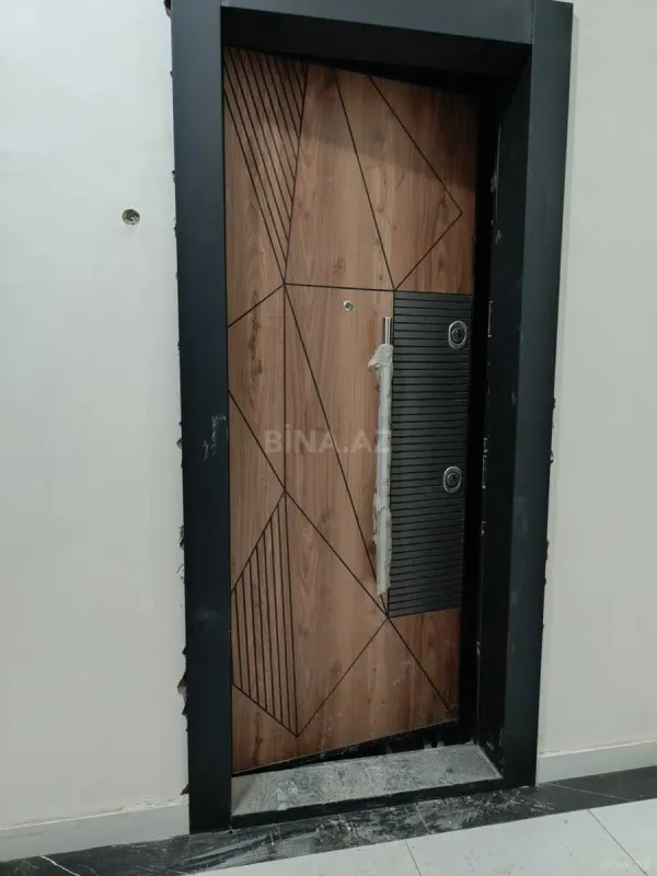 Satılır 4 otaqlı mənzil 148 m²