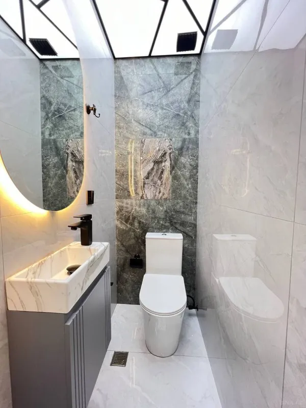 Satılır 4 otaqlı mənzil 150 m²