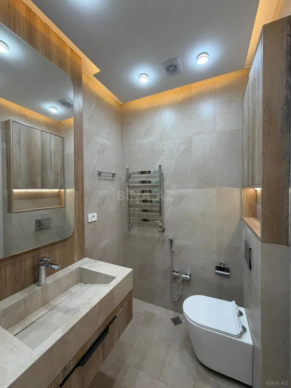 Satılır 4 otaqlı mənzil 145 m²