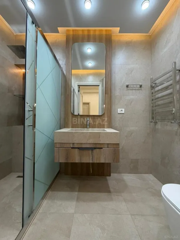 Satılır 4 otaqlı mənzil 145 m²