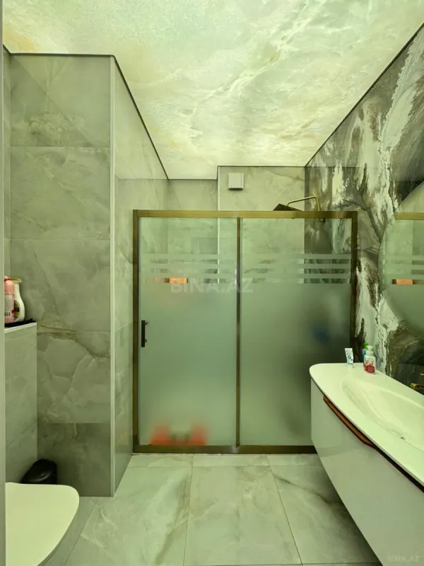 Satılır 4 otaqlı mənzil 165 m²