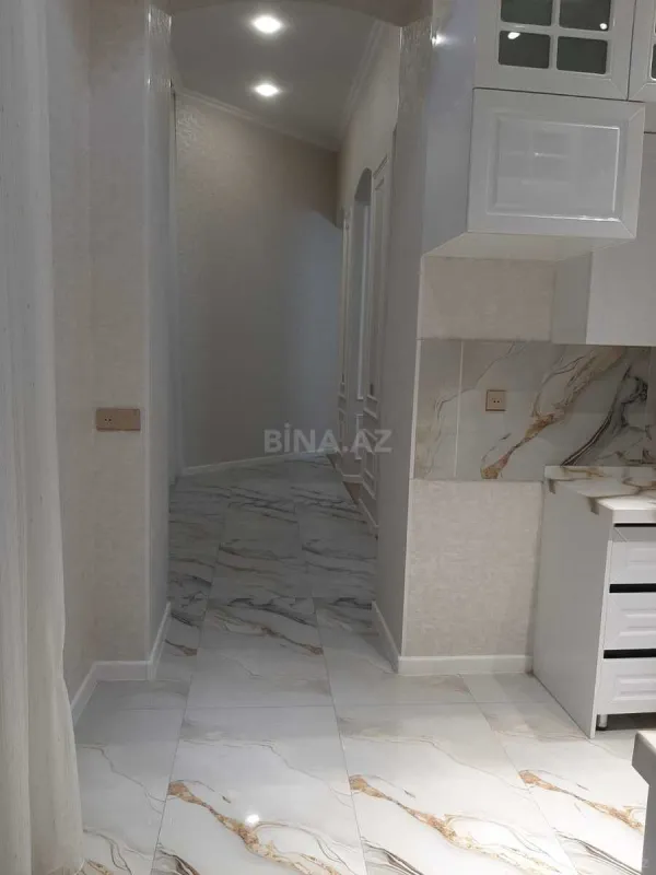 Satılır 4 otaqlı mənzil 155 m²
