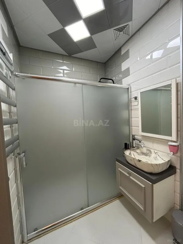 Satılır 4 otaqlı mənzil 175 m²