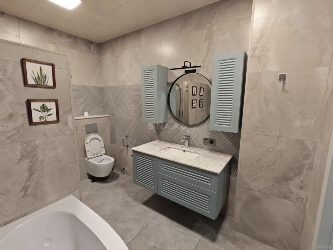 Satılır 4 otaqlı mənzil 135 m²