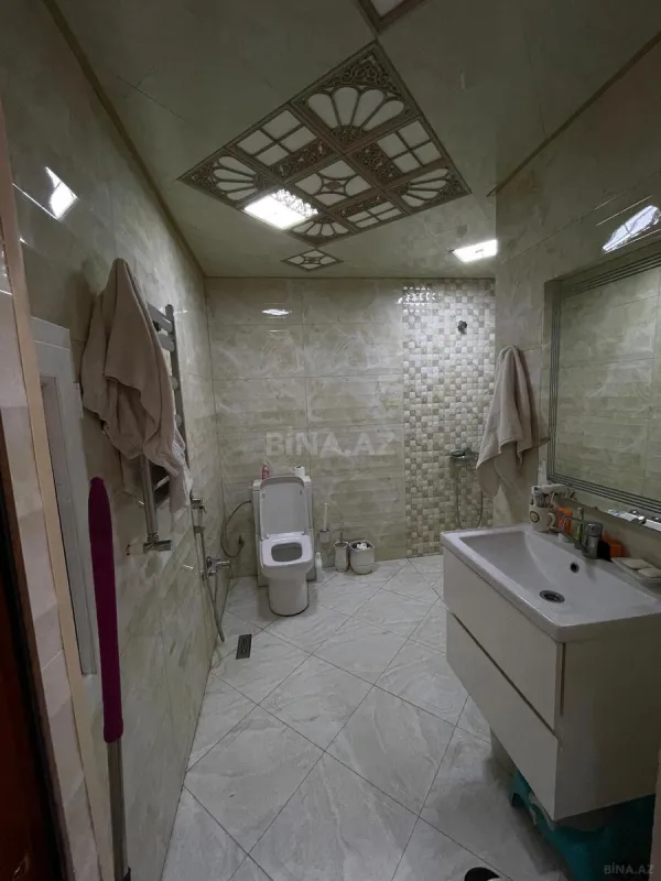 Satılır 4 otaqlı mənzil 186 m²