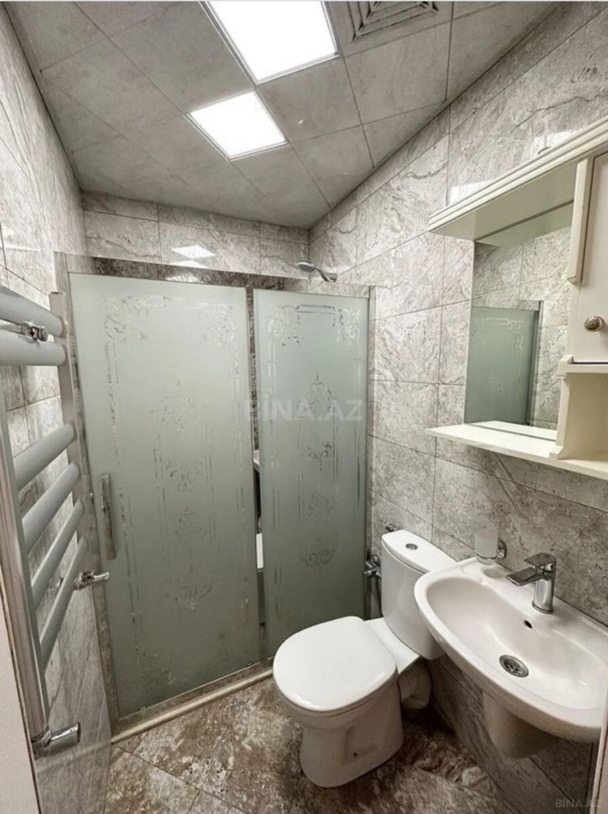 Satılır 4 otaqlı mənzil 130 m²