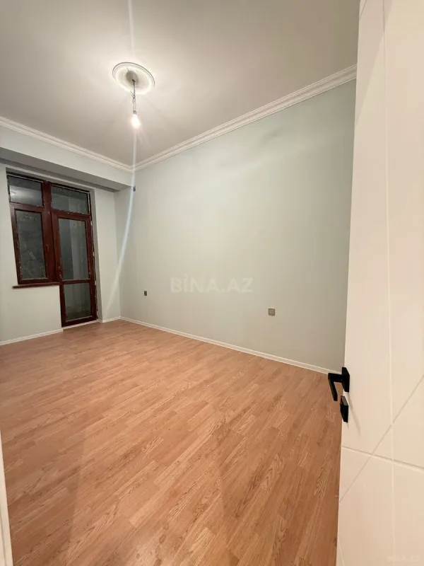 Satılır 4 otaqlı mənzil 129 m²