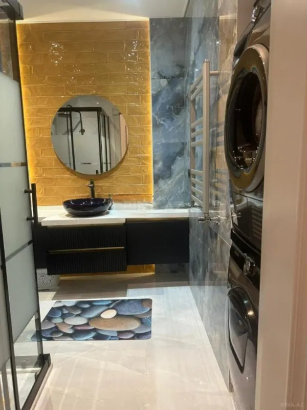 Satılır 4 otaqlı mənzil 132 m²