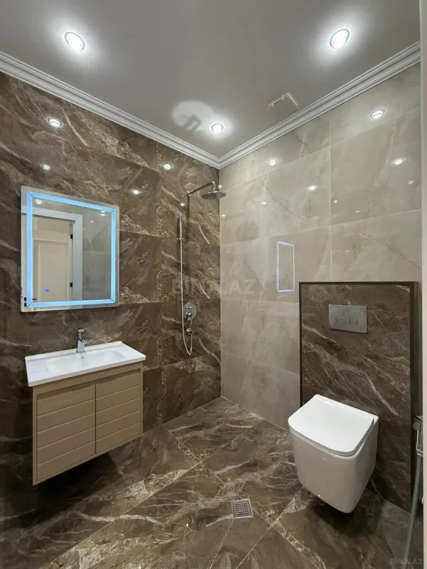 Satılır 3 otaqlı mənzil 132 m²