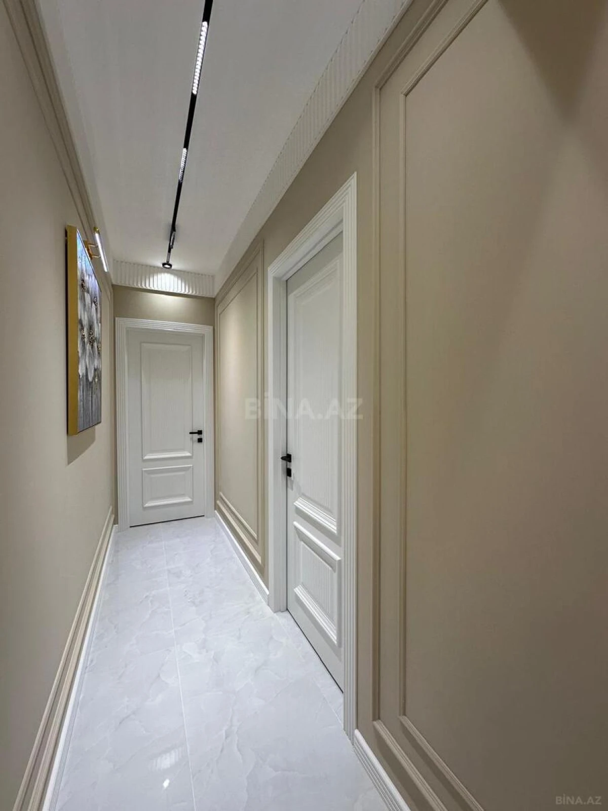 Satılır 4 otaqlı mənzil 140 m²