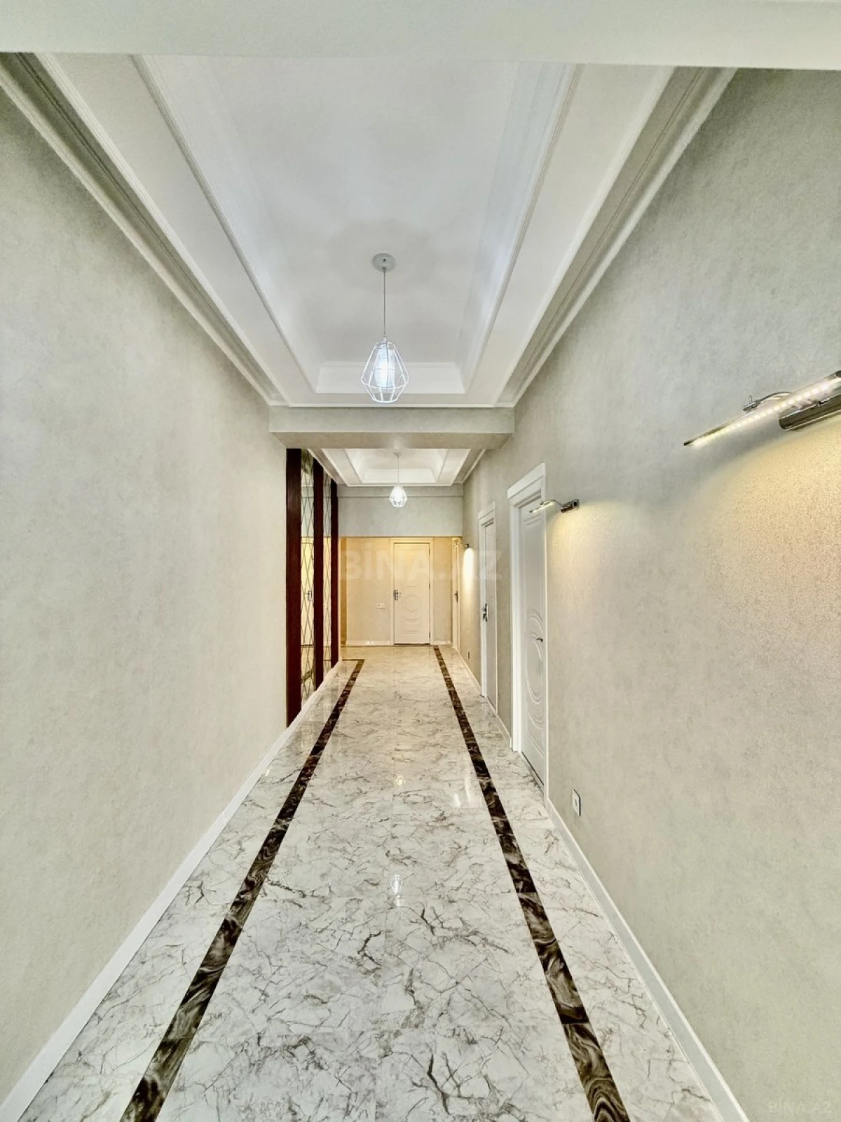Satılır 3 otaqlı mənzil 129 m²