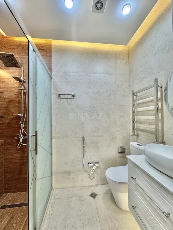 Satılır 4 otaqlı mənzil 145 m²