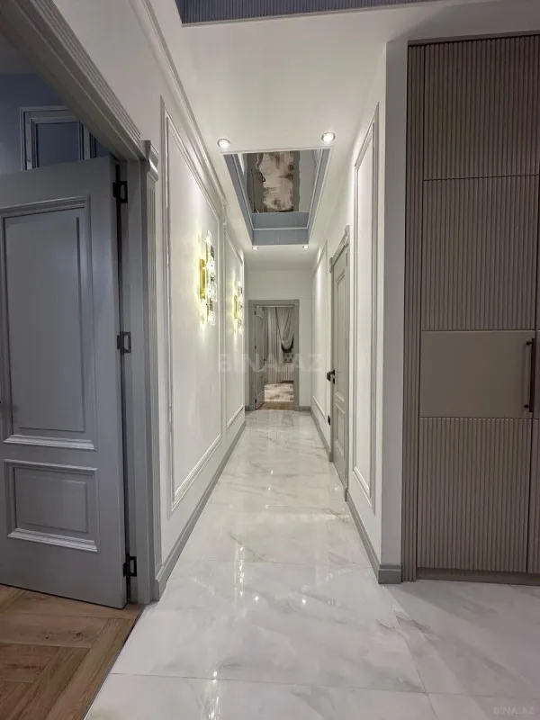 Satılır 4 otaqlı mənzil 132 m²