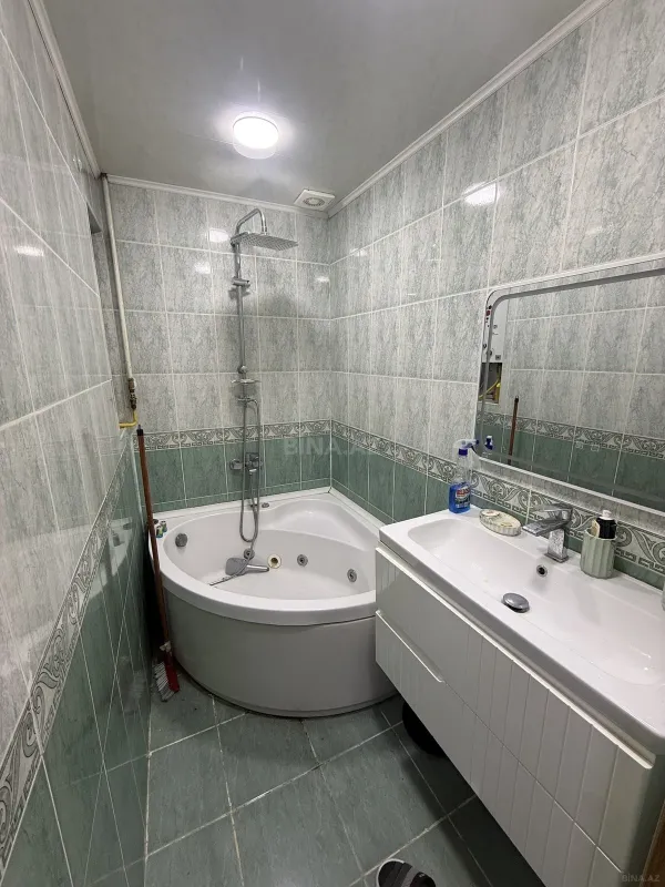 Satılır 4 otaqlı mənzil 100 m²