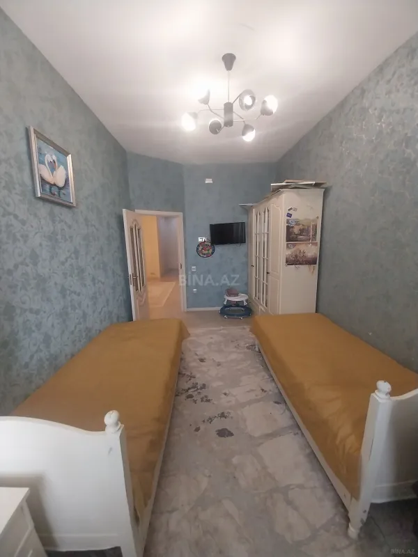 Satılır 3 otaqlı mənzil 129 m²