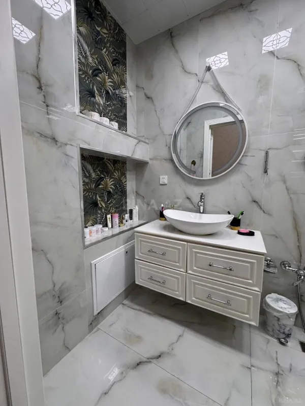 Satılır 4 otaqlı mənzil 205 m²