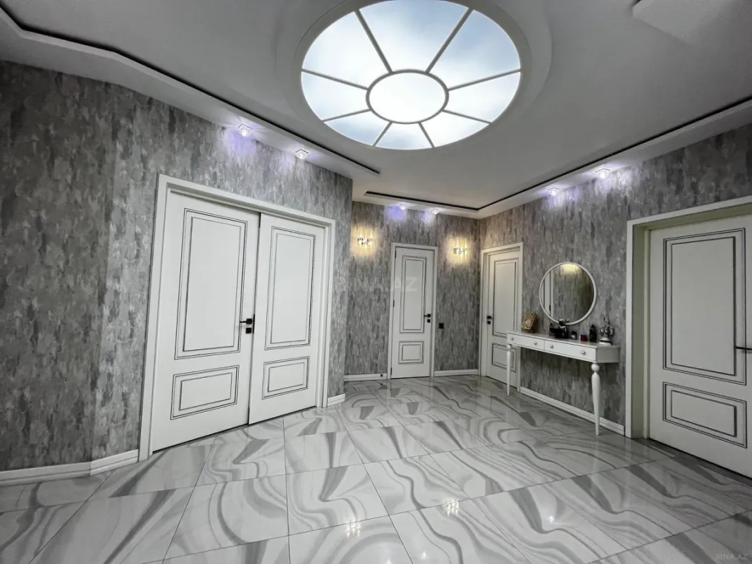 Satılır 4 otaqlı mənzil 200 m²