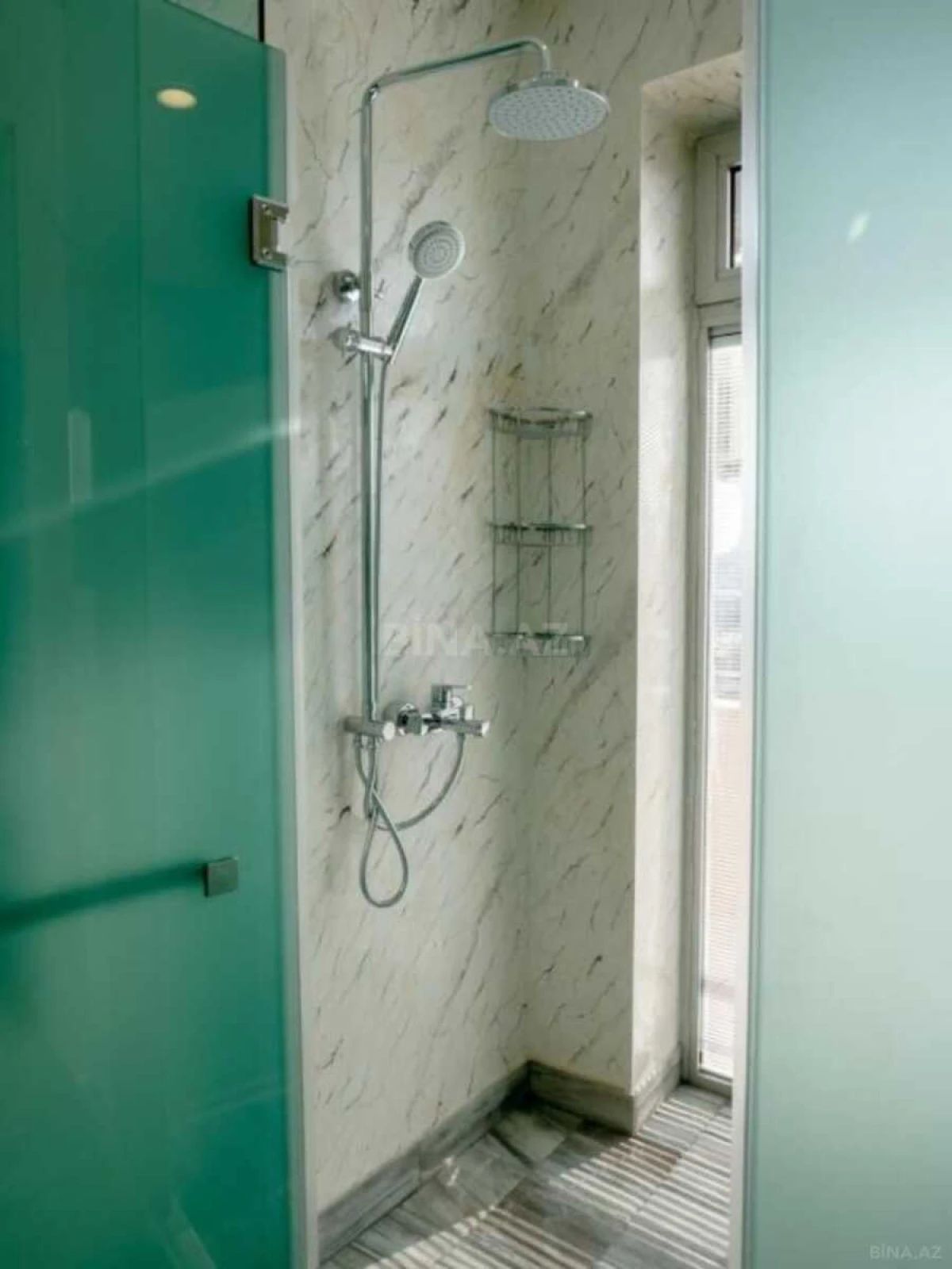 Satılır 4 otaqlı mənzil 135 m²