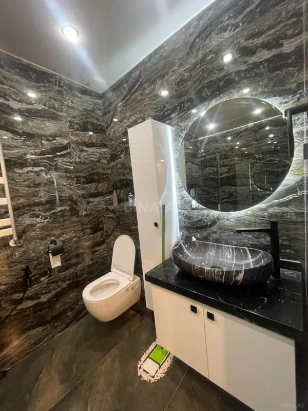 Satılır 4 otaqlı mənzil 179 m²