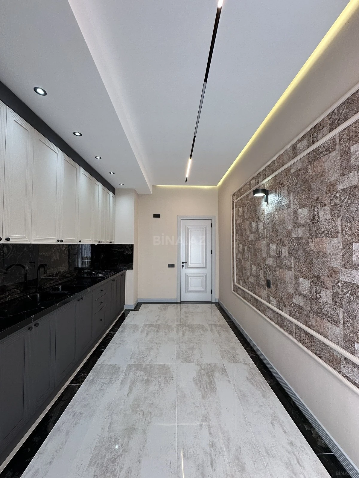 Satılır 4 otaqlı mənzil 131 m²