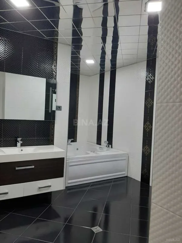 Satılır 4 otaqlı mənzil 198 m²