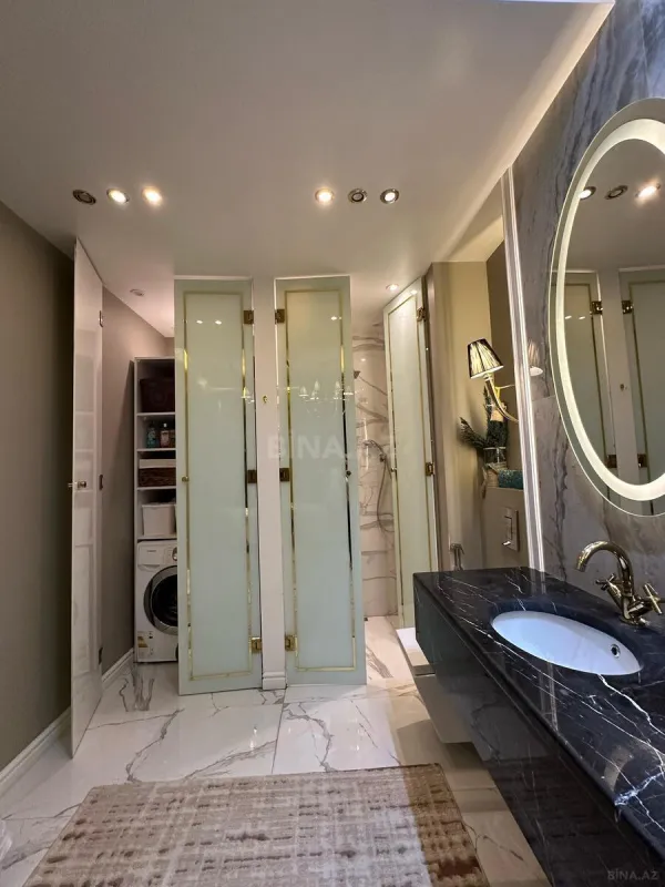 Satılır 4 otaqlı mənzil 135 m²