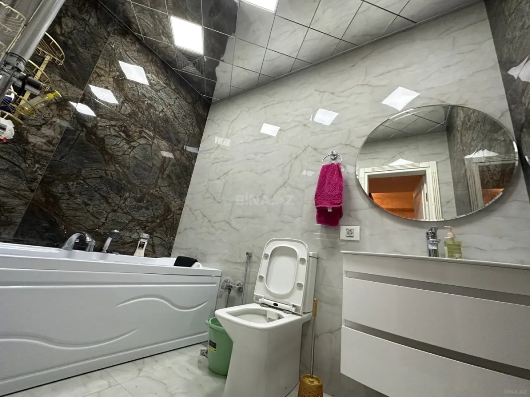 Satılır 4 otaqlı mənzil 180 m²