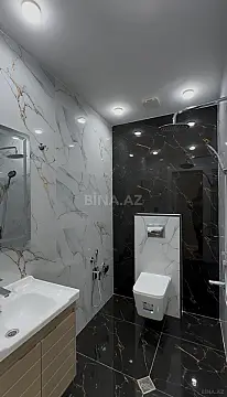 Satılır 4 otaqlı mənzil 140 m²