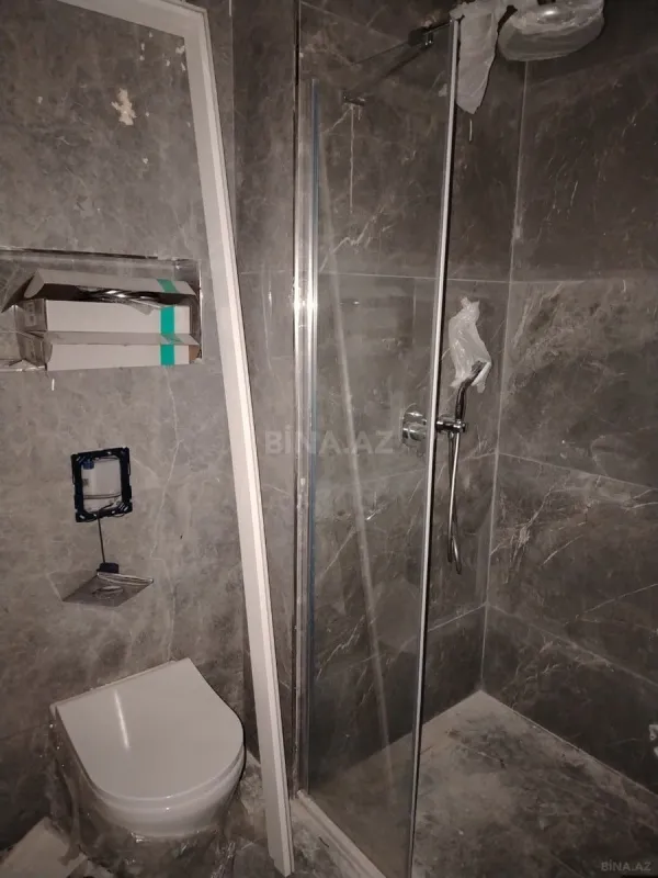 Satılır 4 otaqlı mənzil 130 m²