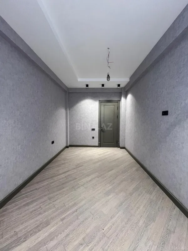 Satılır 4 otaqlı mənzil 164 m²