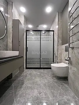 Satılır 4 otaqlı mənzil 164 m²