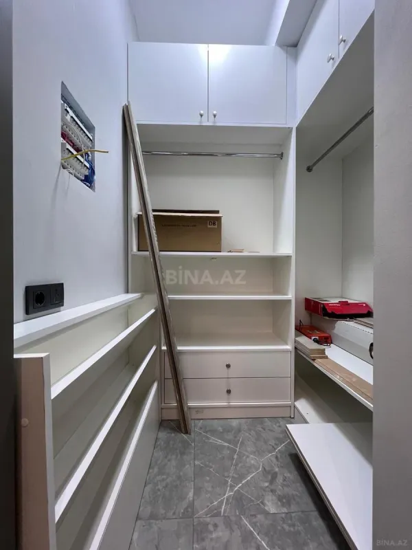 Satılır 4 otaqlı mənzil 164 m²