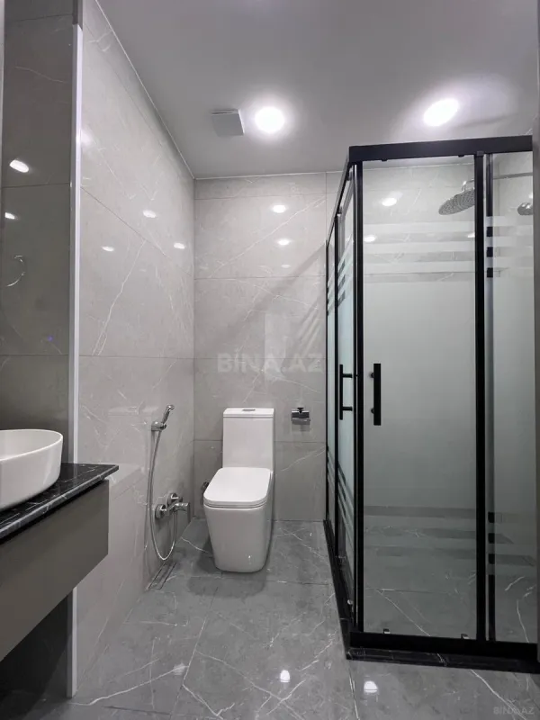 Satılır 4 otaqlı mənzil 164 m²