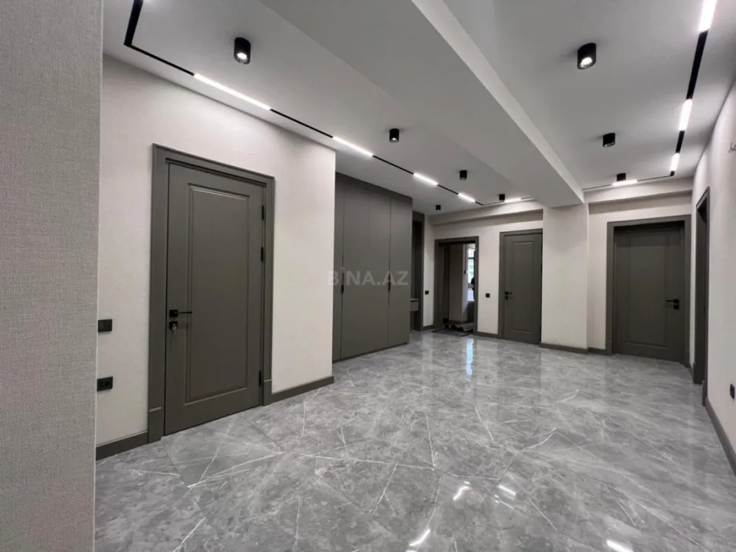 Satılır 4 otaqlı mənzil 164 m²