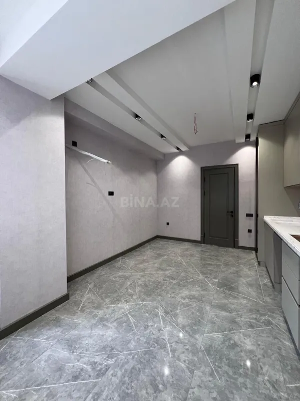 Satılır 4 otaqlı mənzil 164 m²