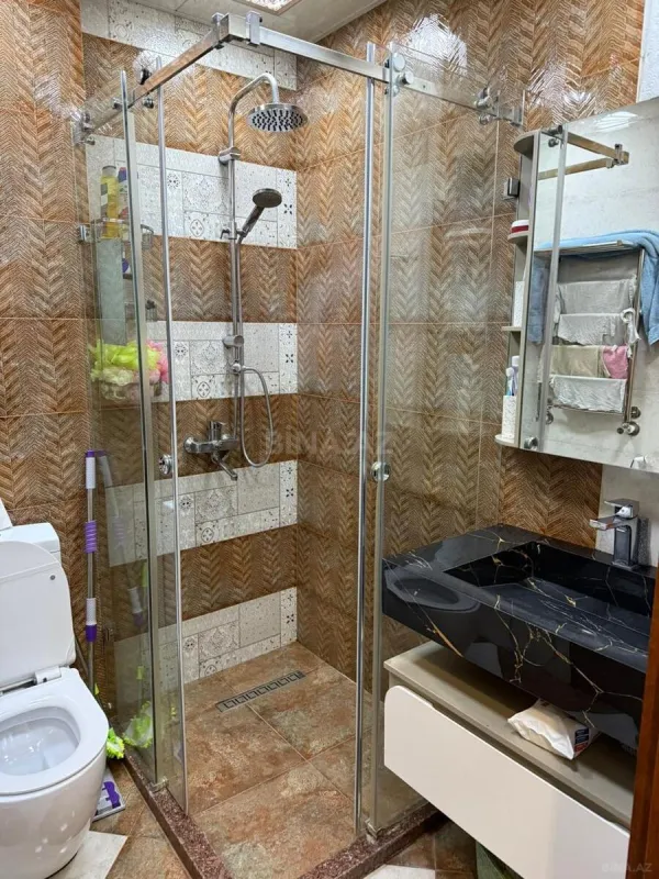 Satılır 4 otaqlı mənzil 162 m²