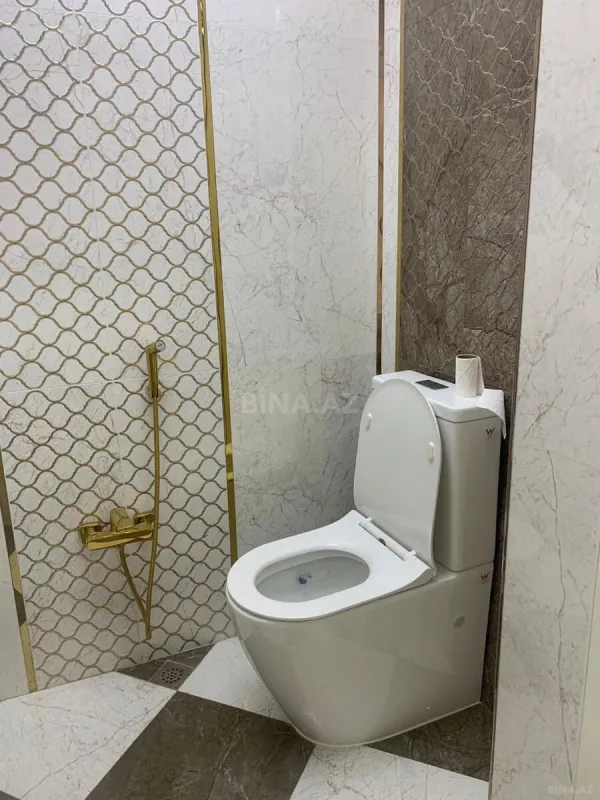 Satılır 4 otaqlı mənzil 140 m²