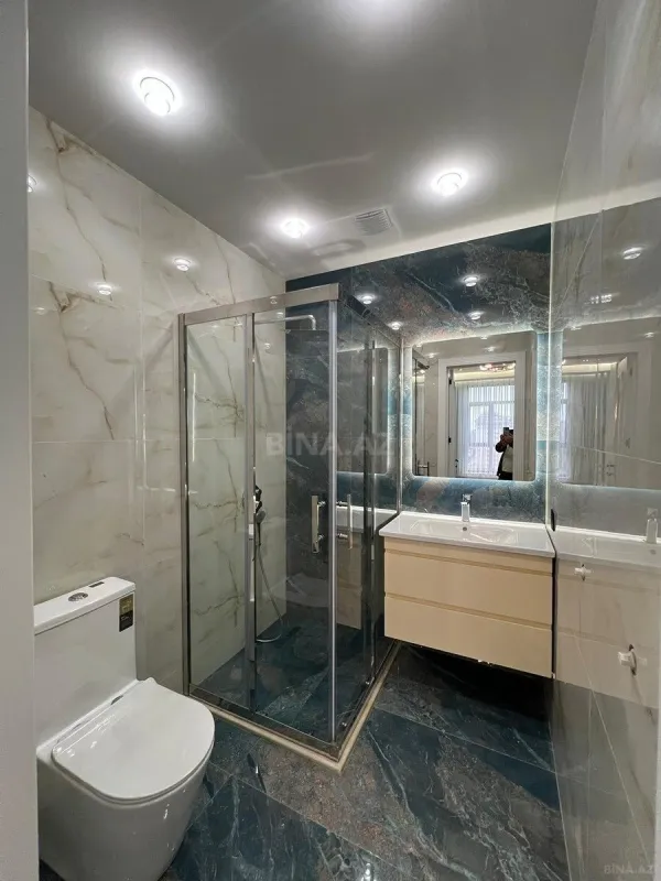 Satılır 4 otaqlı mənzil 140 m²