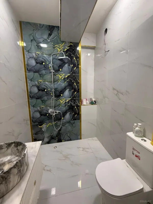 Satılır 3 otaqlı mənzil 128 m²