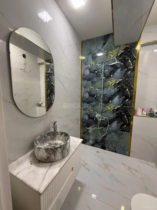 Satılır 3 otaqlı mənzil 128 m²