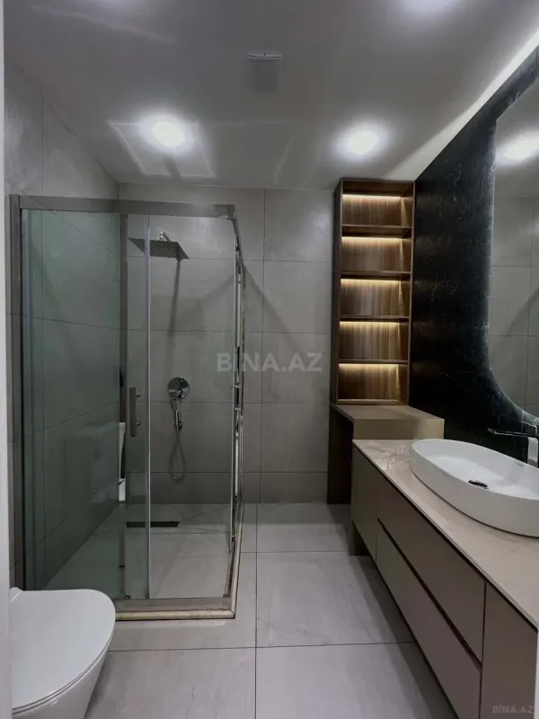 Satılır 4 otaqlı mənzil 140 m²