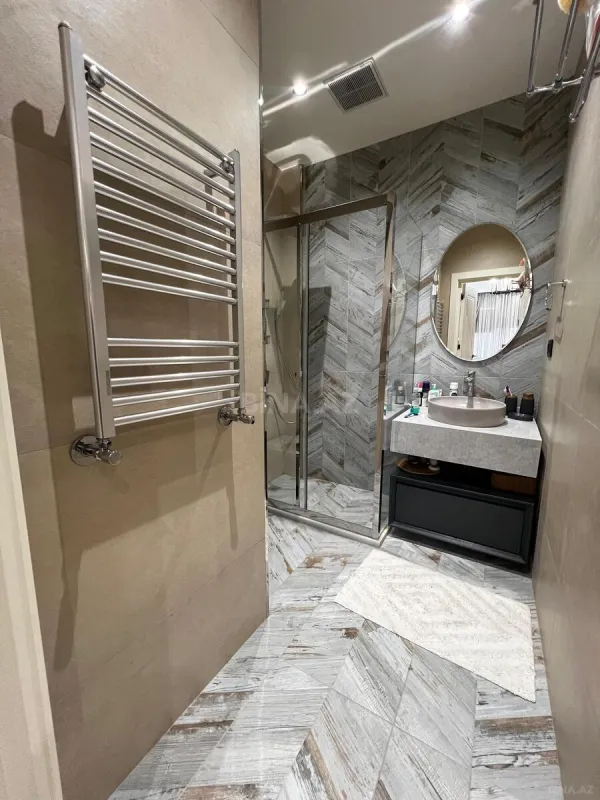 Satılır 4 otaqlı mənzil 140 m²