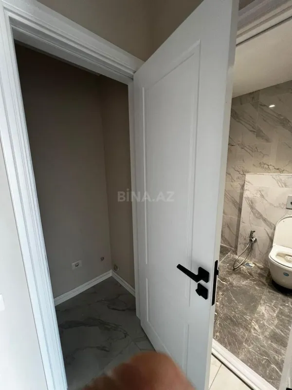 Satılır 4 otaqlı mənzil 120.8 m²