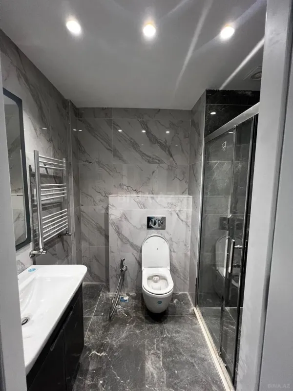 Satılır 4 otaqlı mənzil 120.8 m²