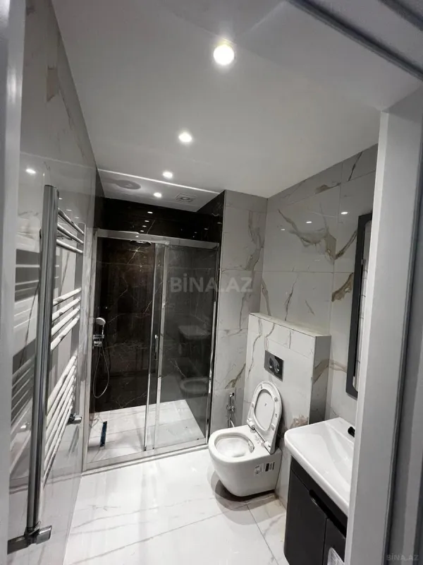 Satılır 4 otaqlı mənzil 120.8 m²