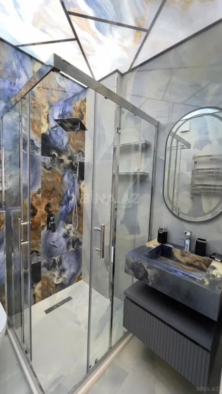 Satılır 4 otaqlı mənzil 230 m²