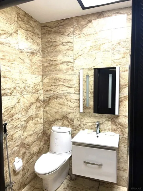 Satılır 4 otaqlı mənzil 160 m²