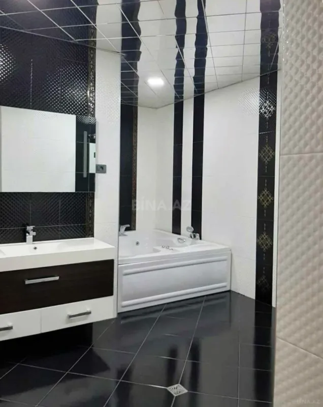 Satılır 4 otaqlı mənzil 200 m²